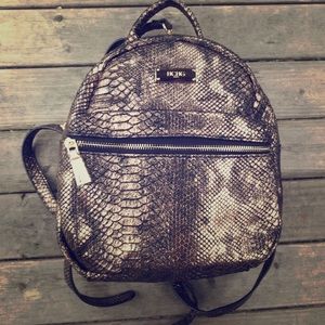 BCBG mini backpack gold and black python leather